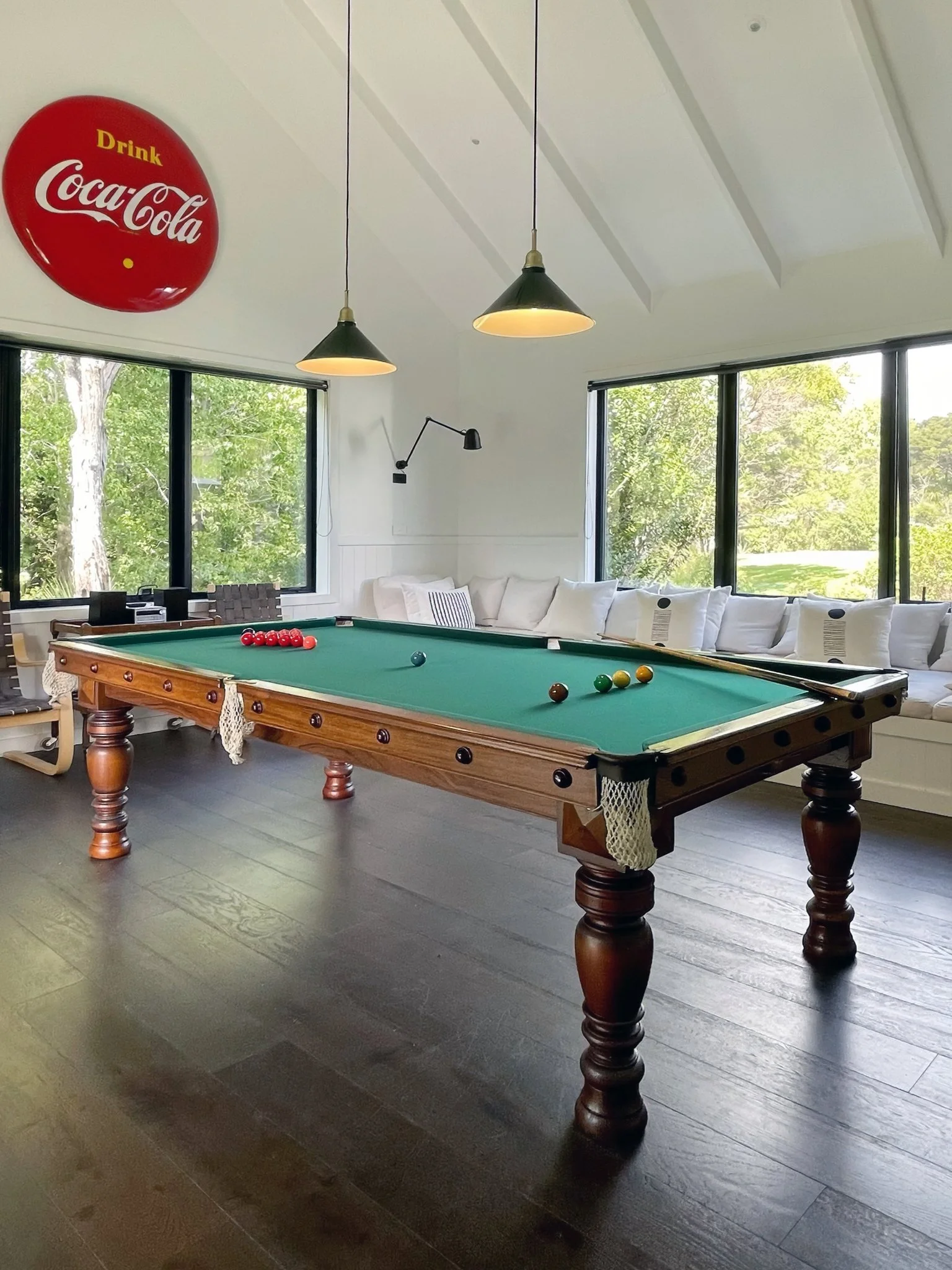 ames room with pool table and vintage Coca Cola sign, Waiotahi Drive Elite Building Mangawhai