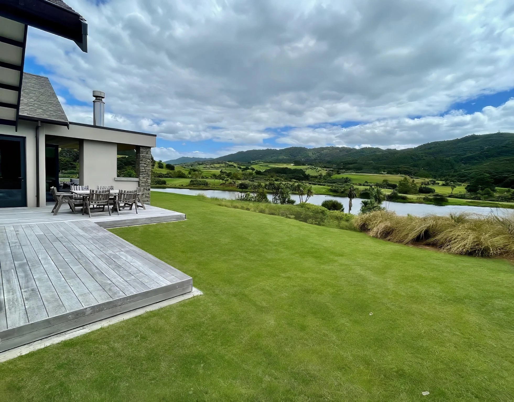 luxury home made with Porotherm blocks imported from Europe exterior lake view