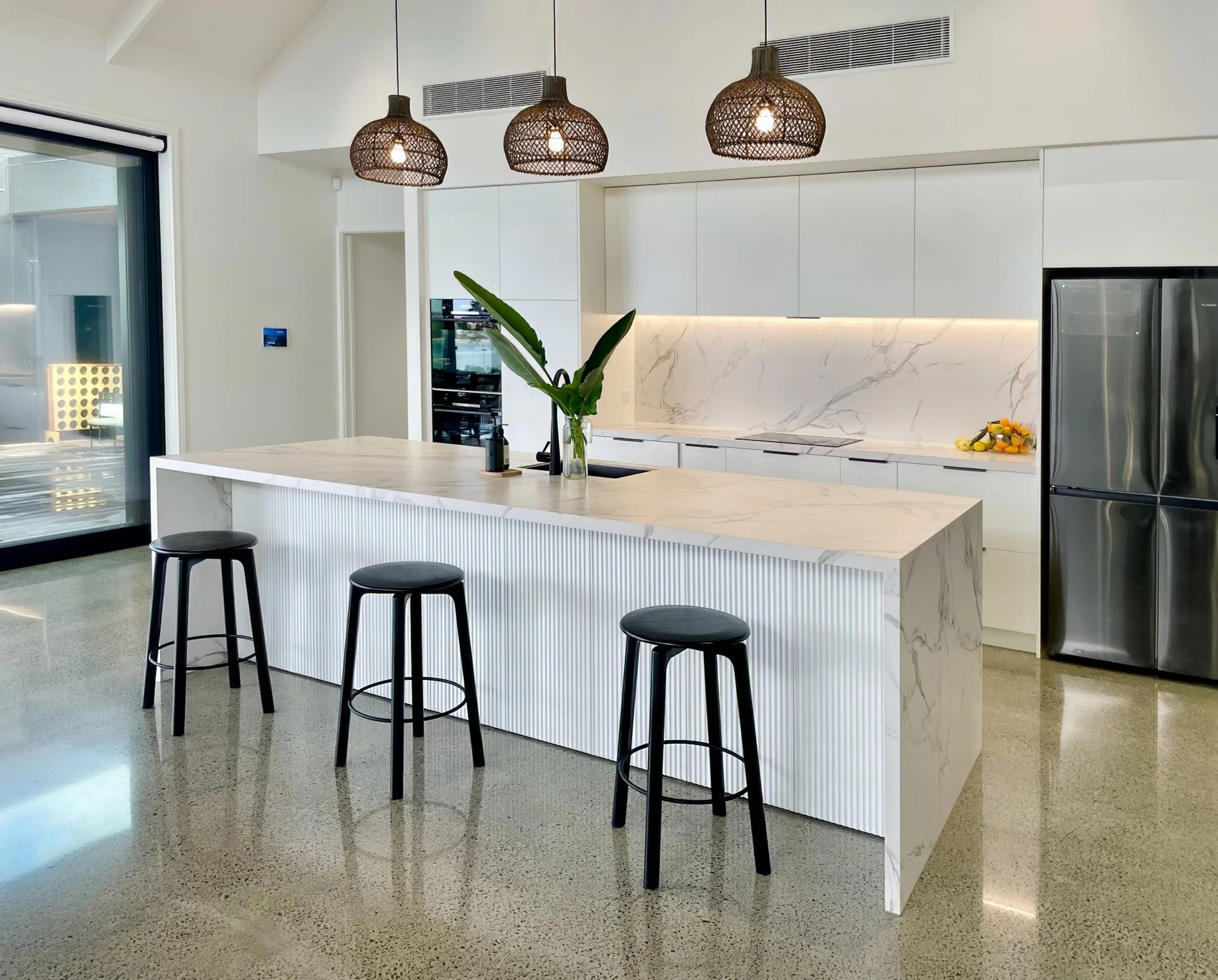 Luxury kitchen with large island bench and pendant lighting, certified builders Mangawhai