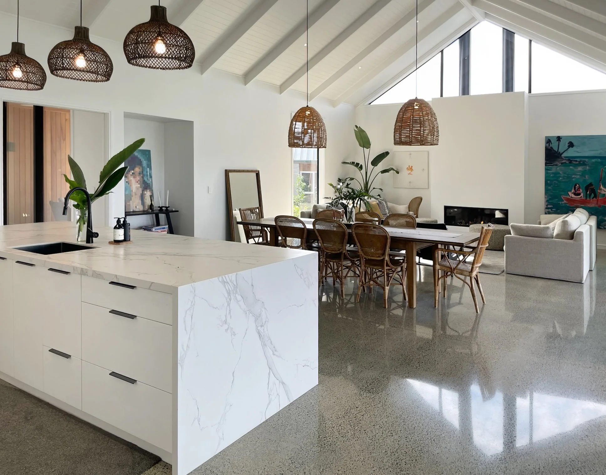 Sand Dune new home marble kitchen island and open plan dining, Mangawhai