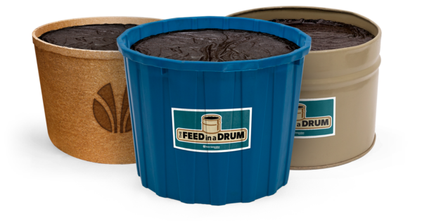 Three circular containers filled with FlaxLic, a New Generation Supplements product, with labels indicating they are for livestock nutrition