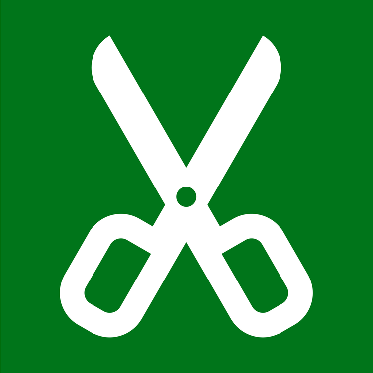White scissors icon on a green background.
