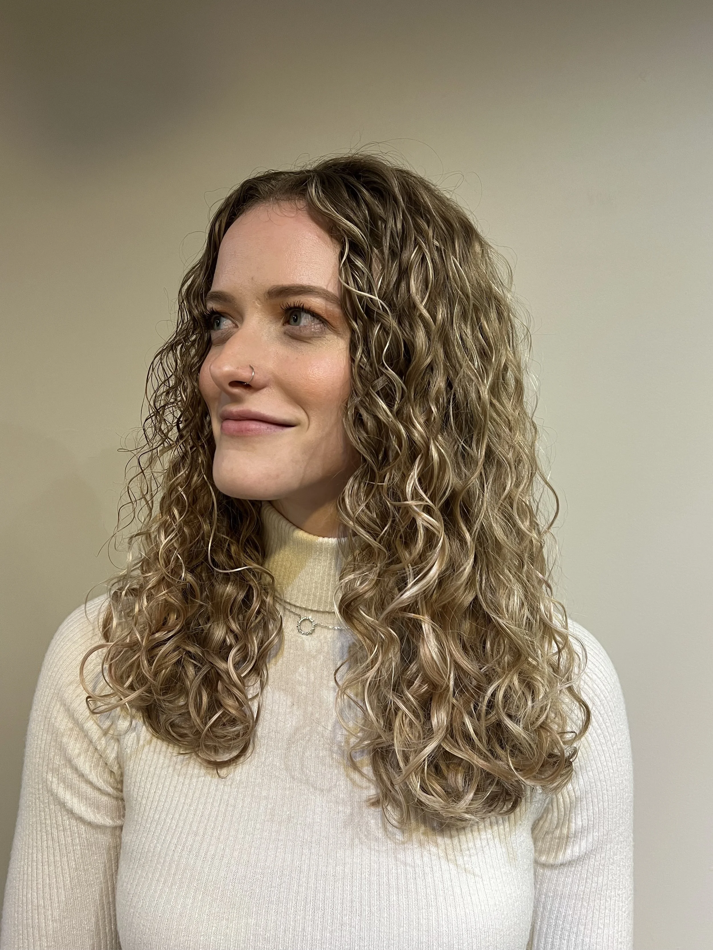 Very healthy curls after a picture highlight service.