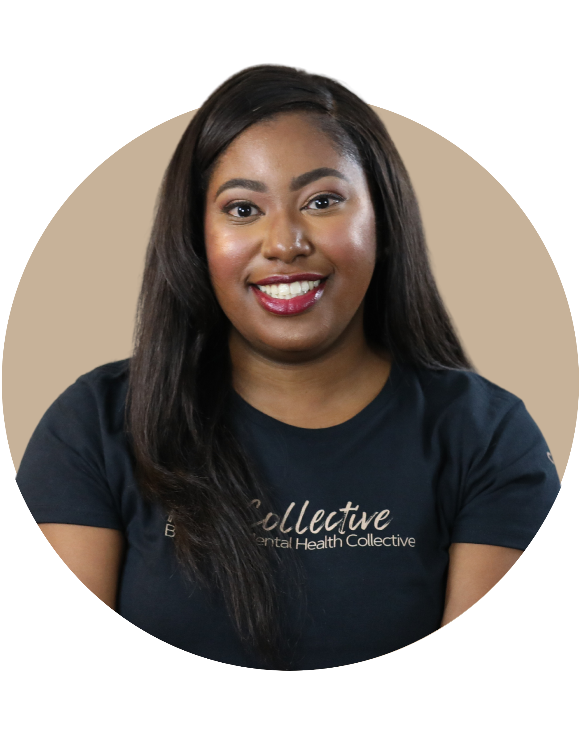 A young woman with long dark hair smiling, wearing a black t-shirt with text related to behavioral health, against a beige background.