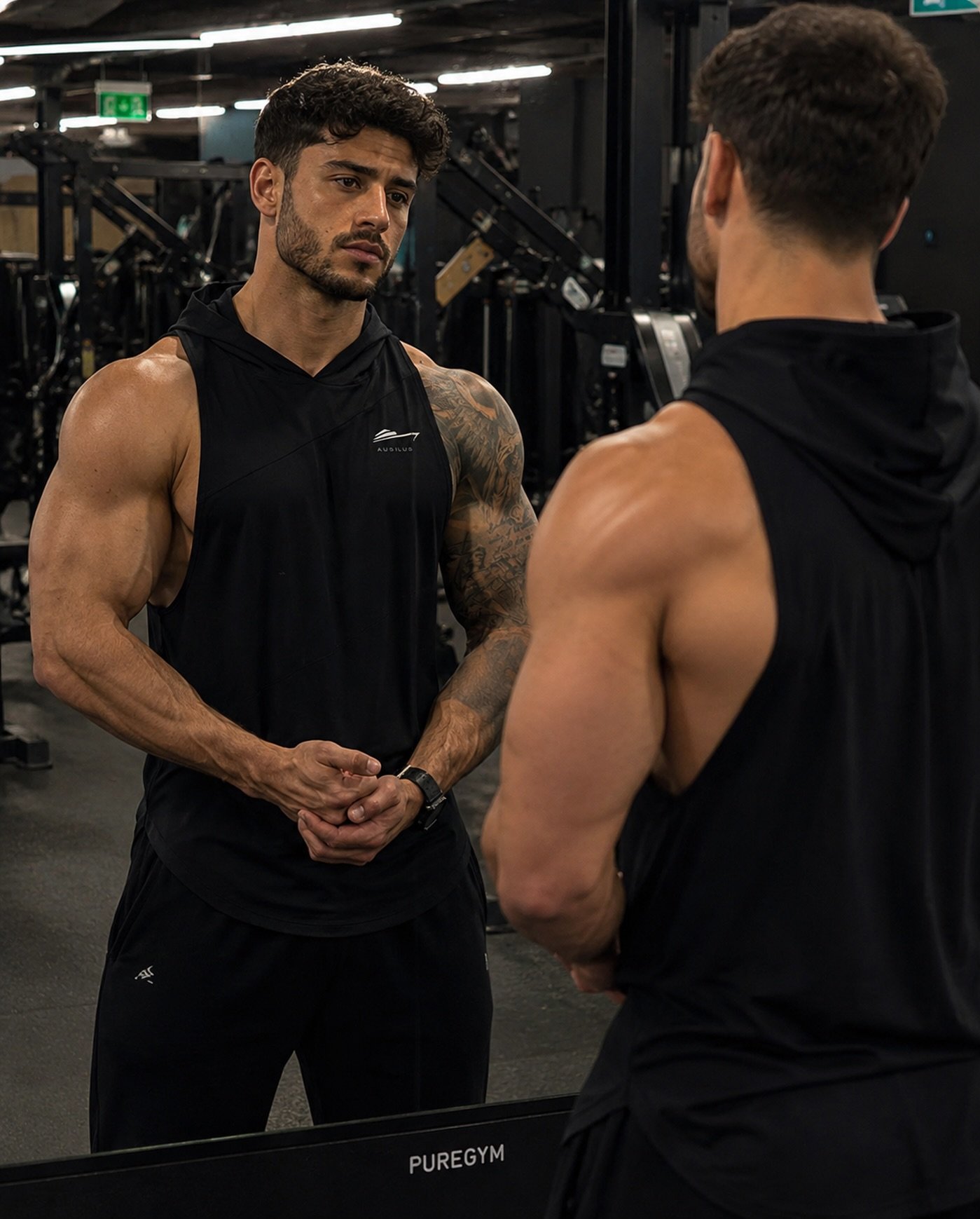 LOOK THE PART. PERFORM BETTER. 🖤

Every rep starts with discipline. Every workout builds confidence.

The Auxxilus Hooded V-Stringer is engineered for athletes who demand unrestricted movement, lightweight comfort, and a modern athletic fit. Designe