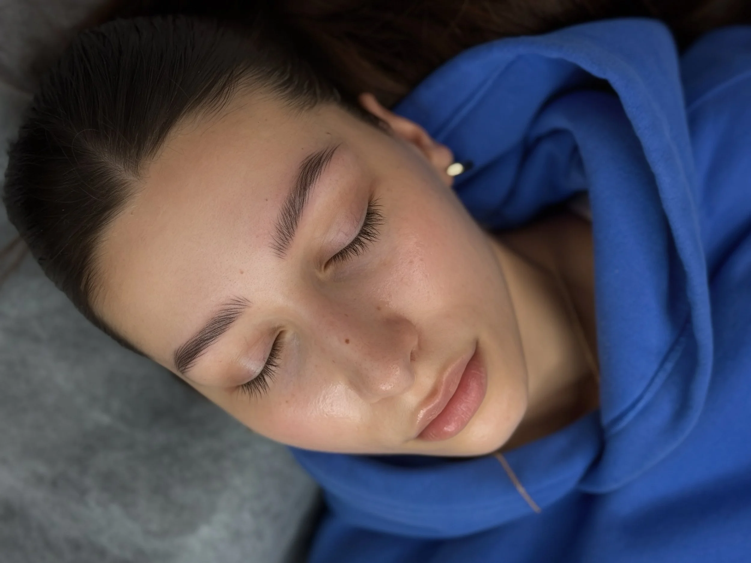 Before and after image of nano brow tattoo with subtle shape enhancement and realistic texture.