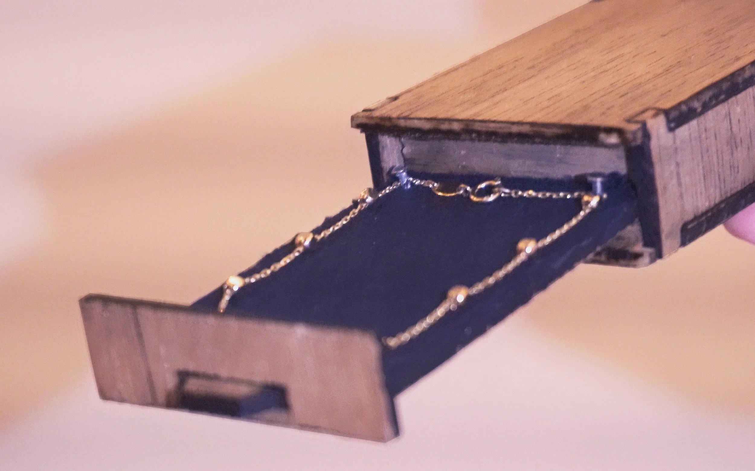 A wooden jewelry box with drawer and soft lining. Another Pinewood Slurpy video (click to image view).