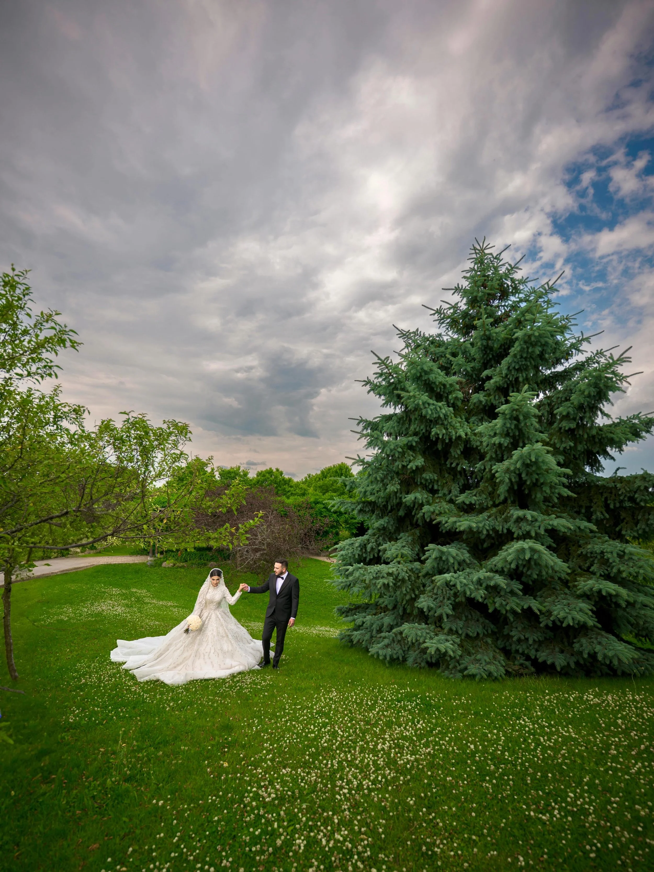 A new beginning under the beautiful sky and cider tree. 
#weddingphotographers #weddingphotoinspiration #nikon #torontoweddings
