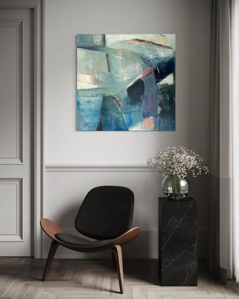 Large abstract painting by Gera Dunachie set above a modern occasional  chair and black granite stand with glass vase