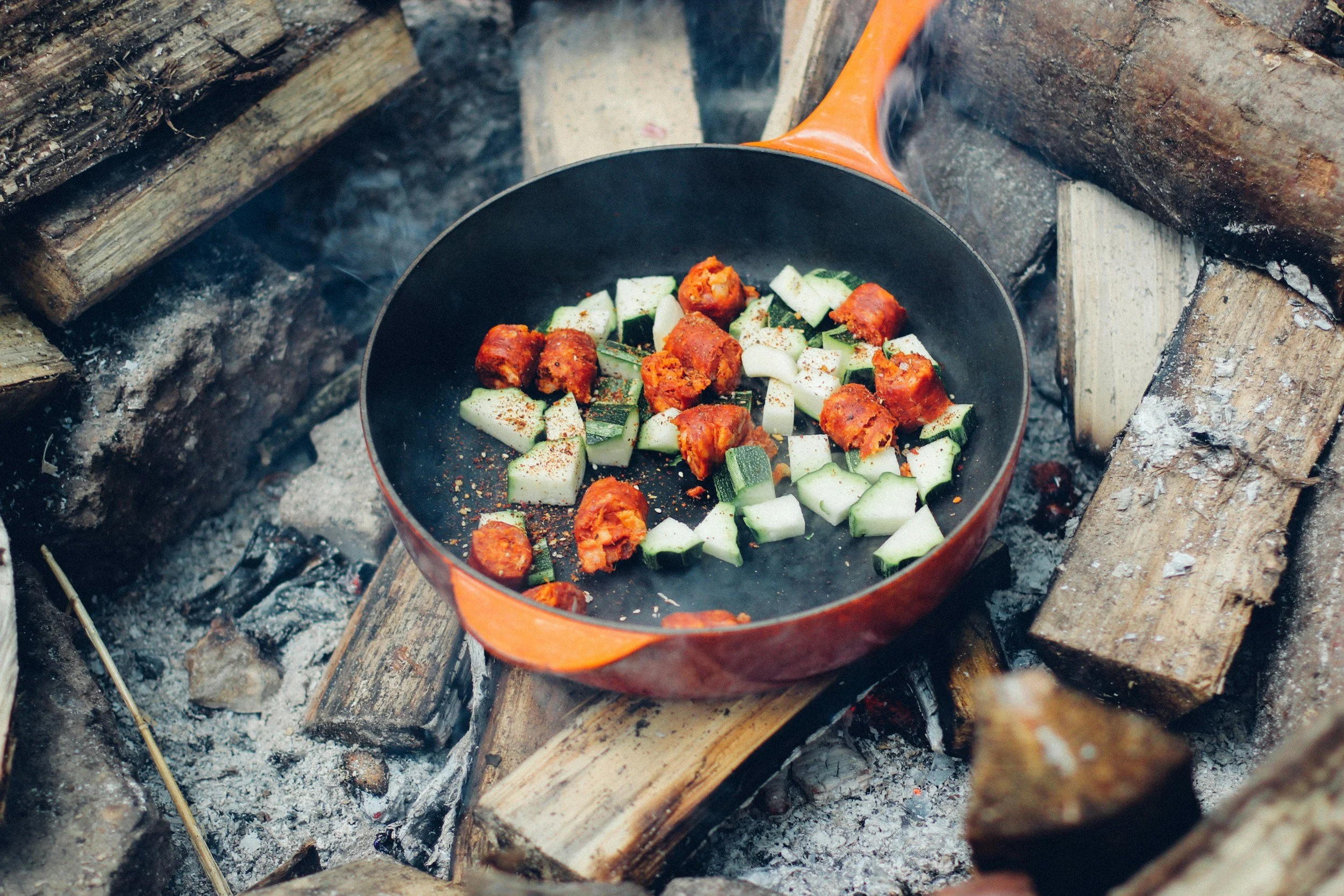 a photo of camp cooking with fresh vegetables