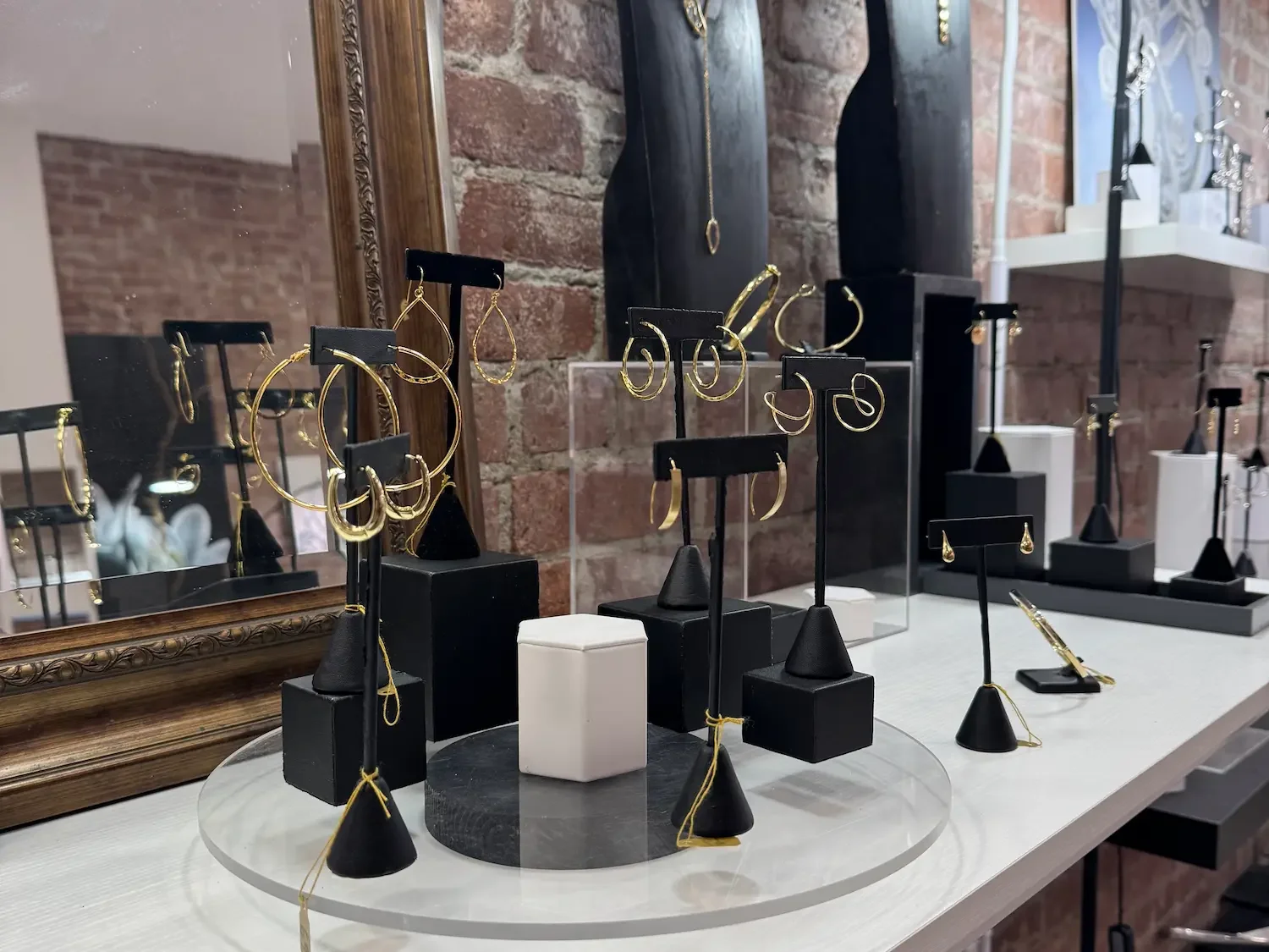 gold earrings in a jewelry store beacon