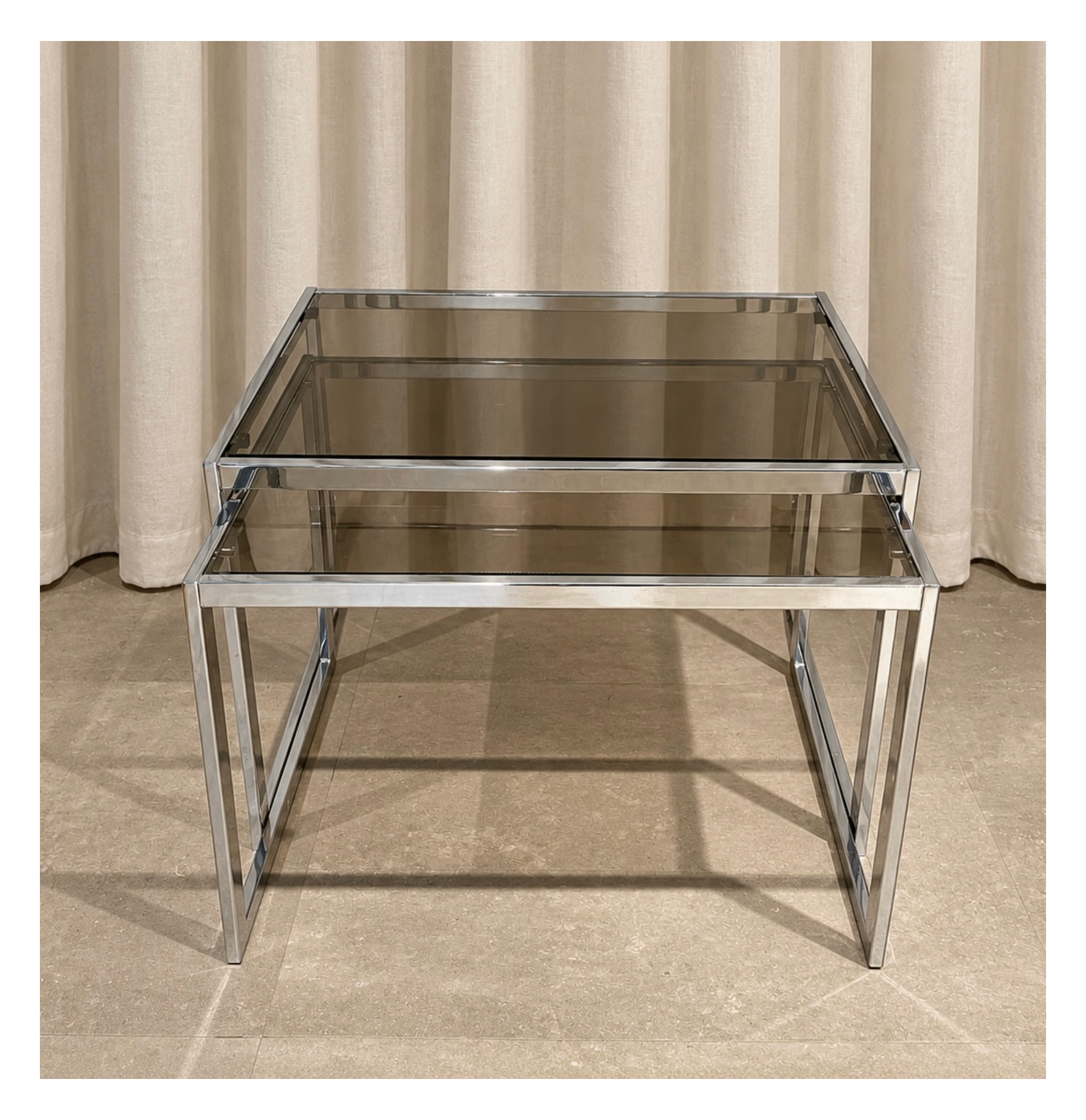 chrome and smoked glass nesting tables by Howard Miller