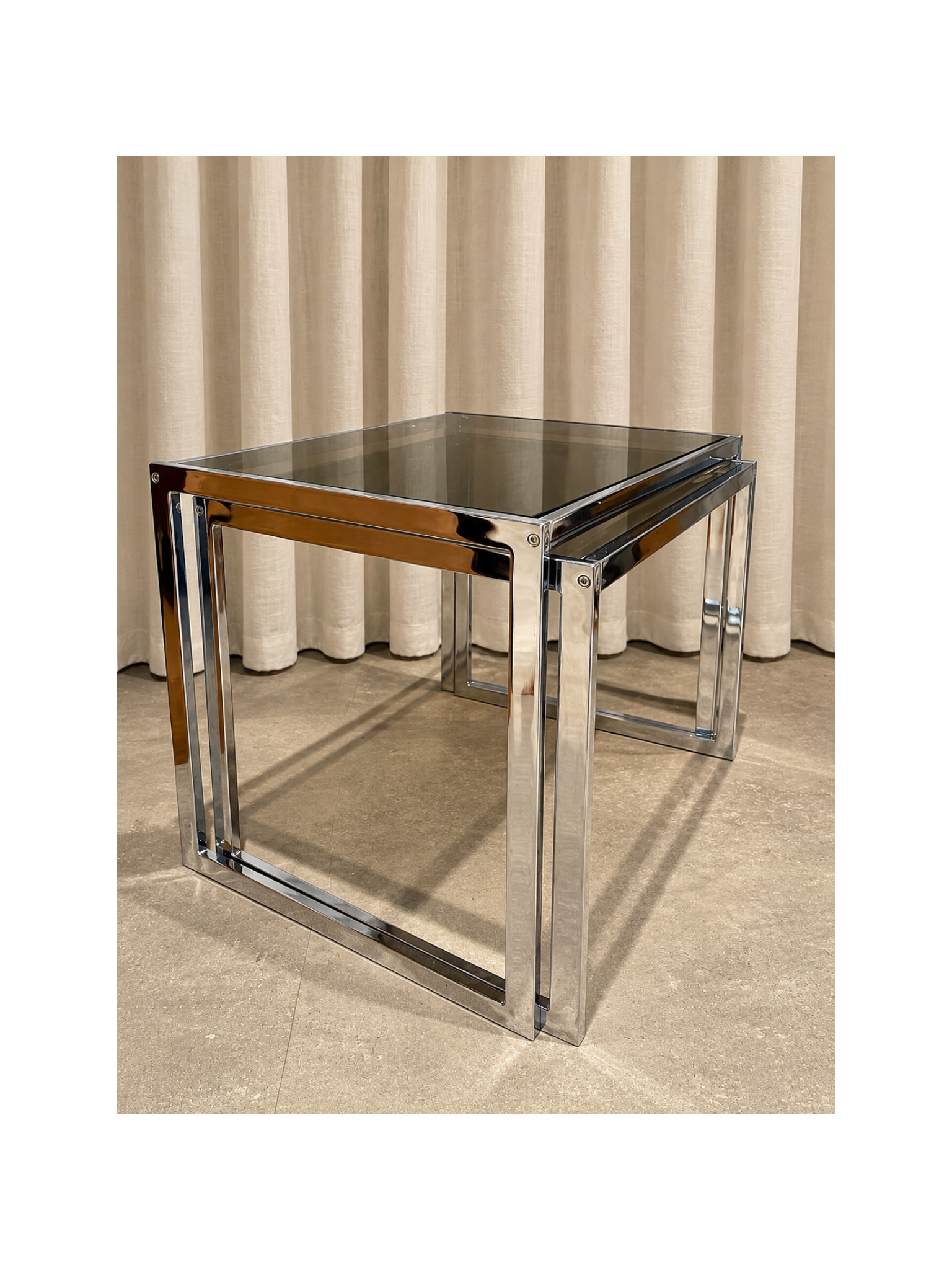 chrome and smoked glass nesting tables by Howard Miller