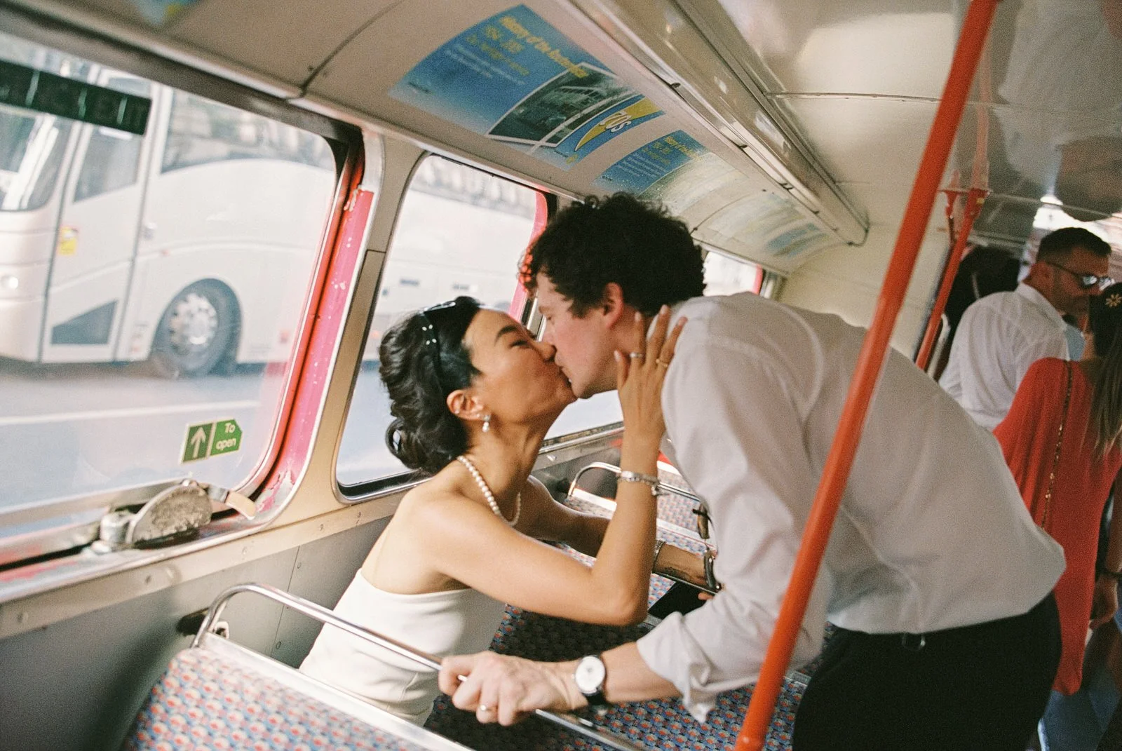 Red London bus wedding photography