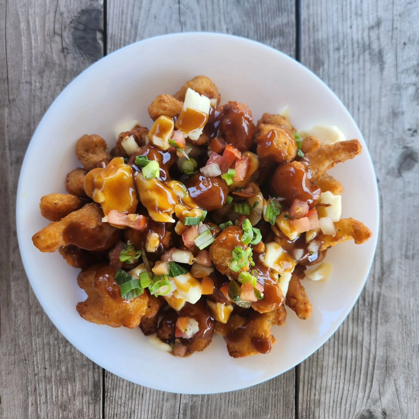 Crispy Cauliflower Poutine

#poutinefries #poutinelove #poutines #cauliflowerrecipes #cauliflowerwings #cauliflowercheese #cauliflowerbites #mississaugafood #Mississauga #mississaugaeats #etobicokefood #etobicokeeats #gtafood #gtafoodie #torontofoodi