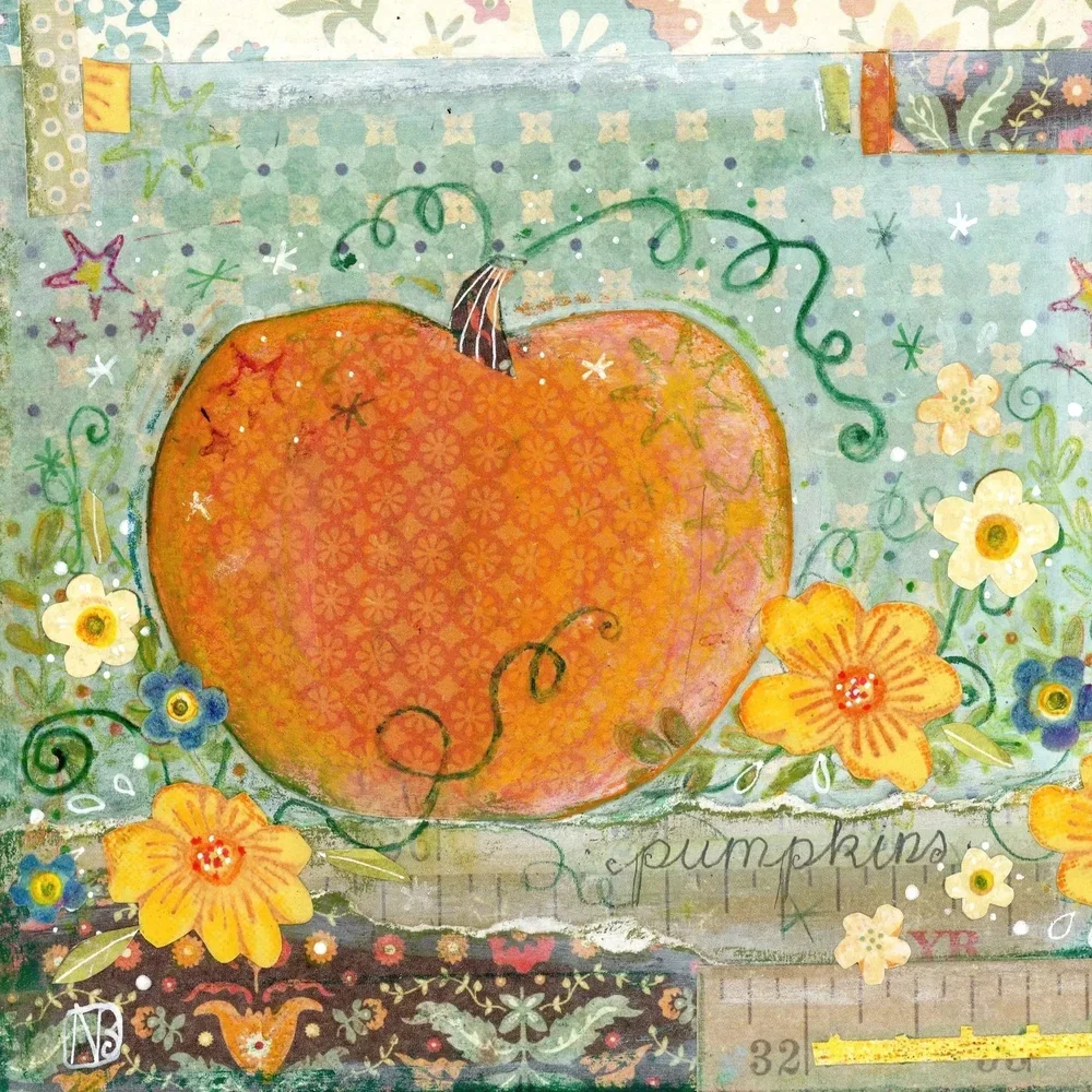 Big orange pumpkin in a flowering garden.