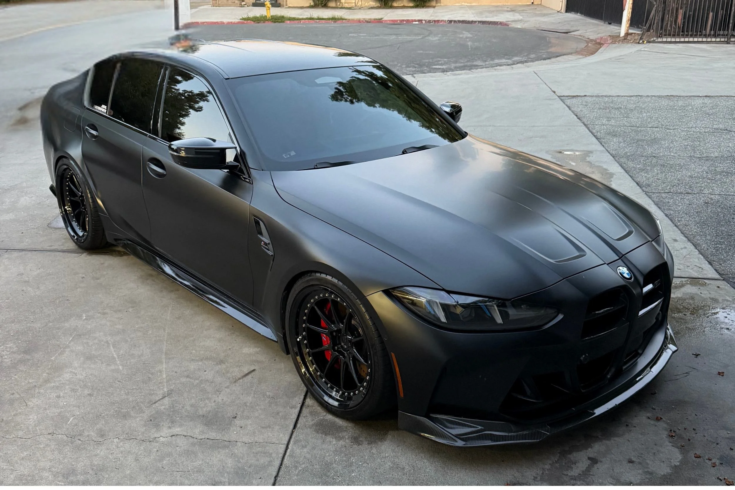 A perfectly detailed luxury car with a deep, glossy ceramic coating finish.