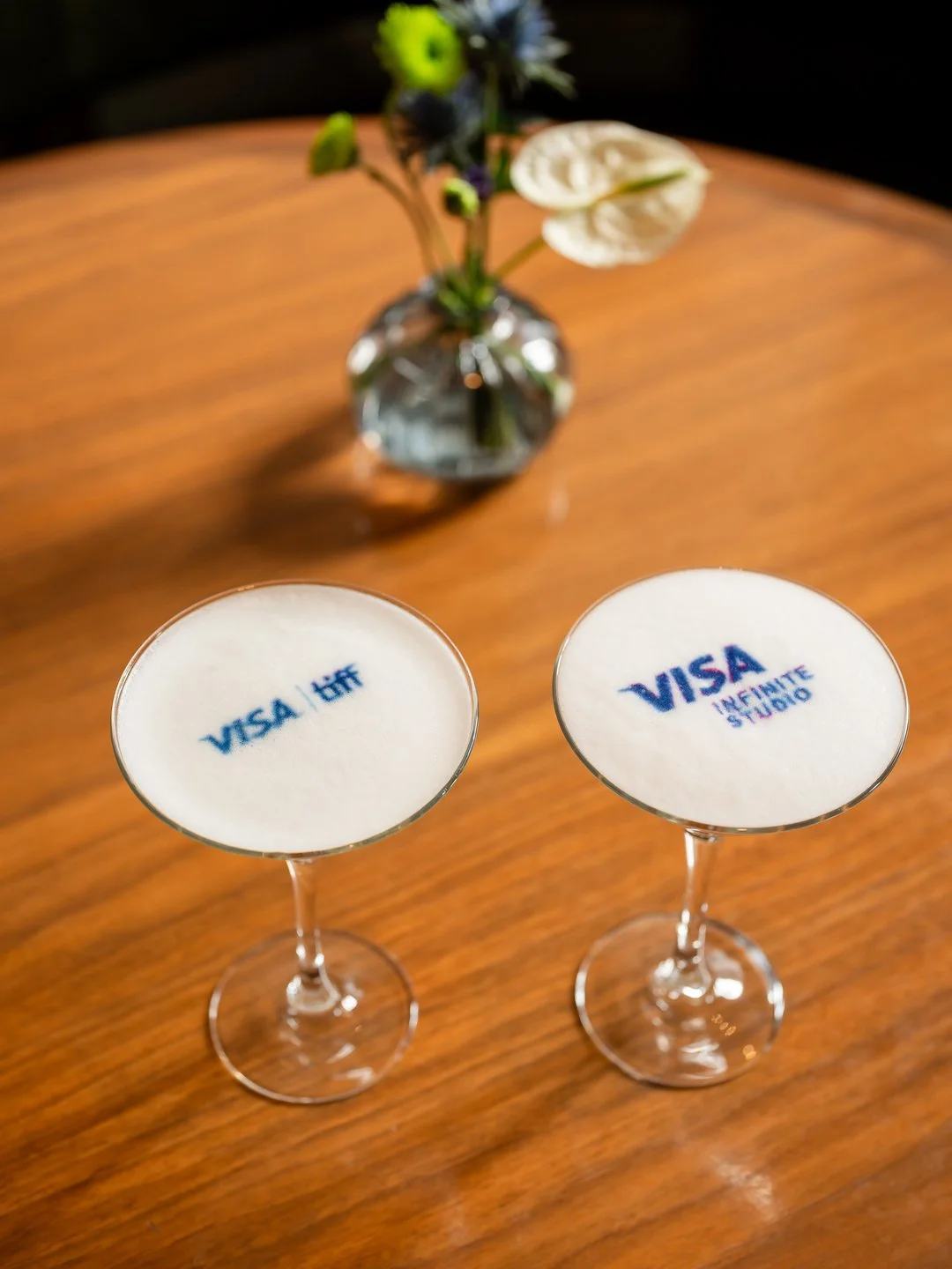 Even the smallest details carried the Visa and TIFF identity. These branded drinks add a closer, quieter view of the event alongside the room and guest photographs.

#uptownmedia #TIFF #EventDetails #BrandPhotography