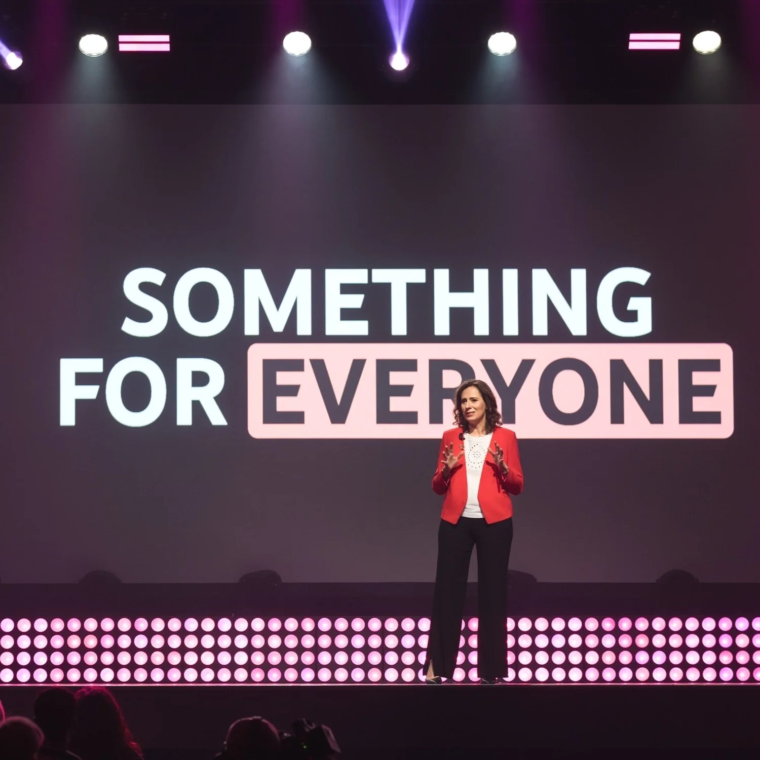 Speaker at a branded conference photographed by Uptown Media