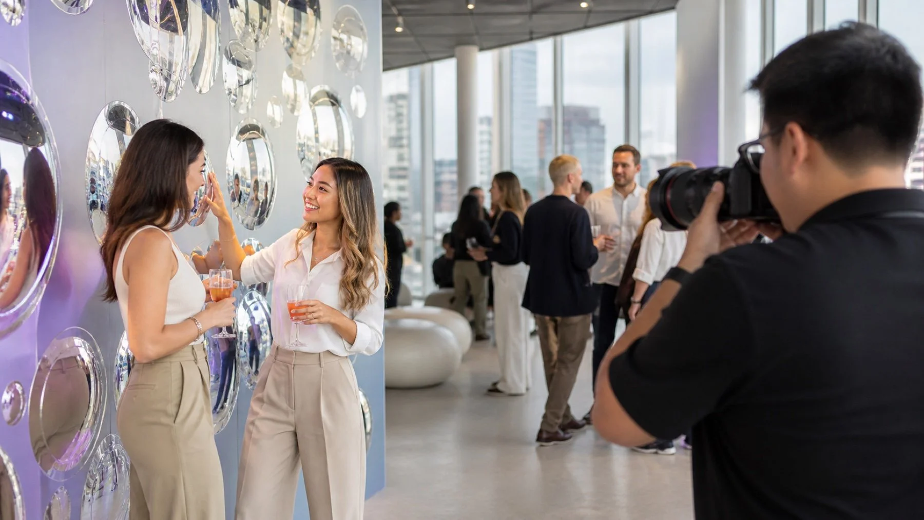 Event guests engaging with a branded activation while a photographer captures campaign moments in Calgary