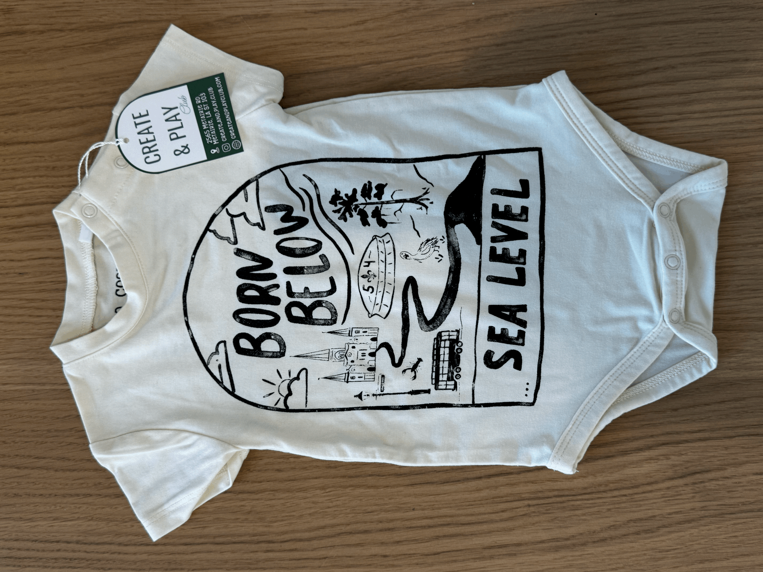 Born Below Sea Level Onesie