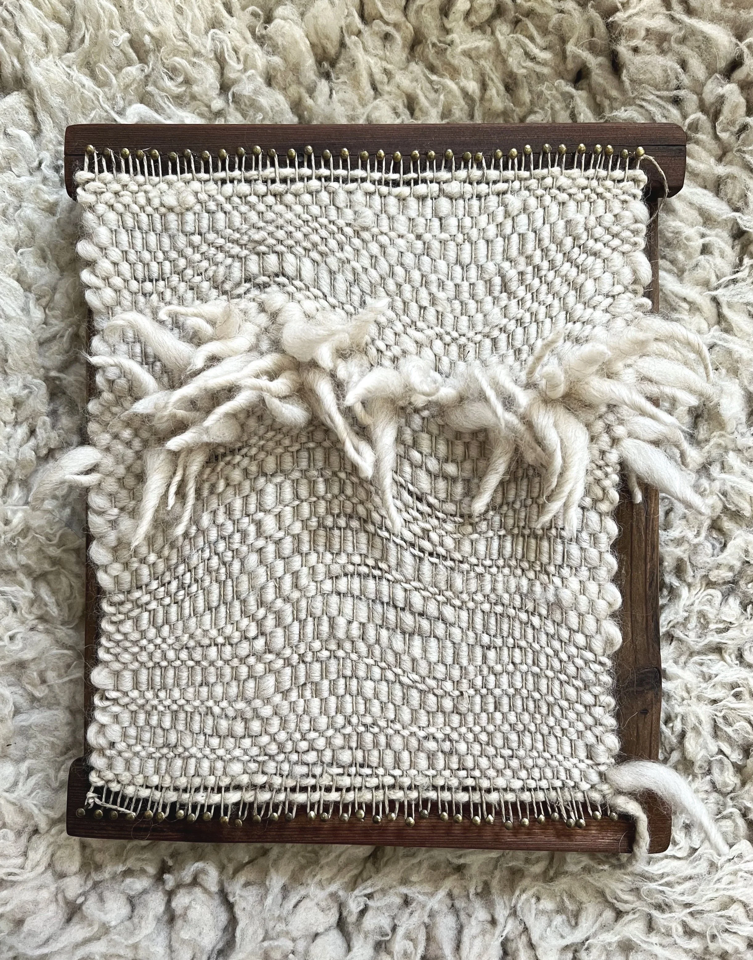 Handmade lap loom (12 in x 10 in), salvaged redwood & Gram's brass nails, 2022