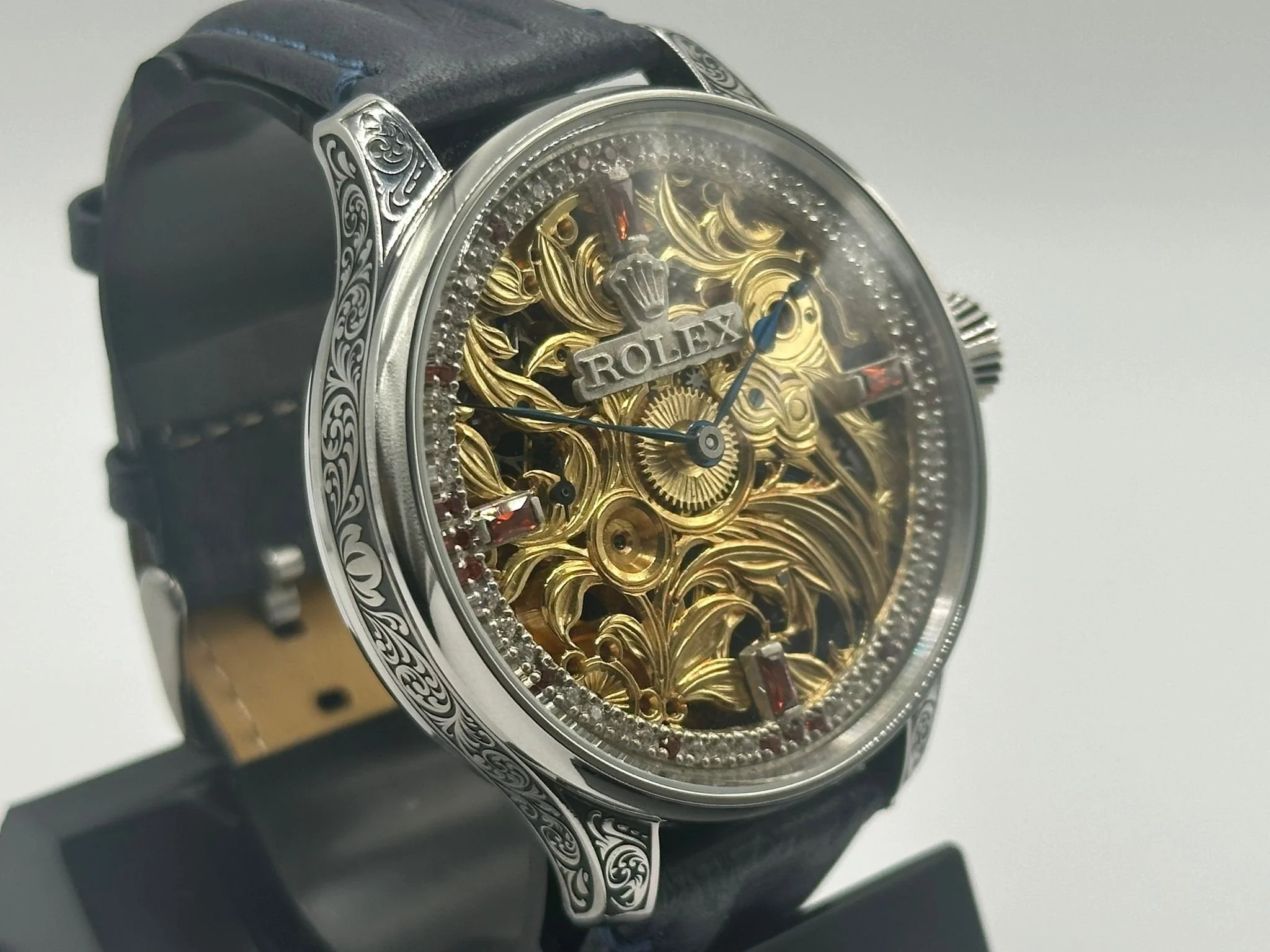 Superb men's 1920's Rolex lever wrist watch, with stunning skeleton dial with diamonds and rubies.