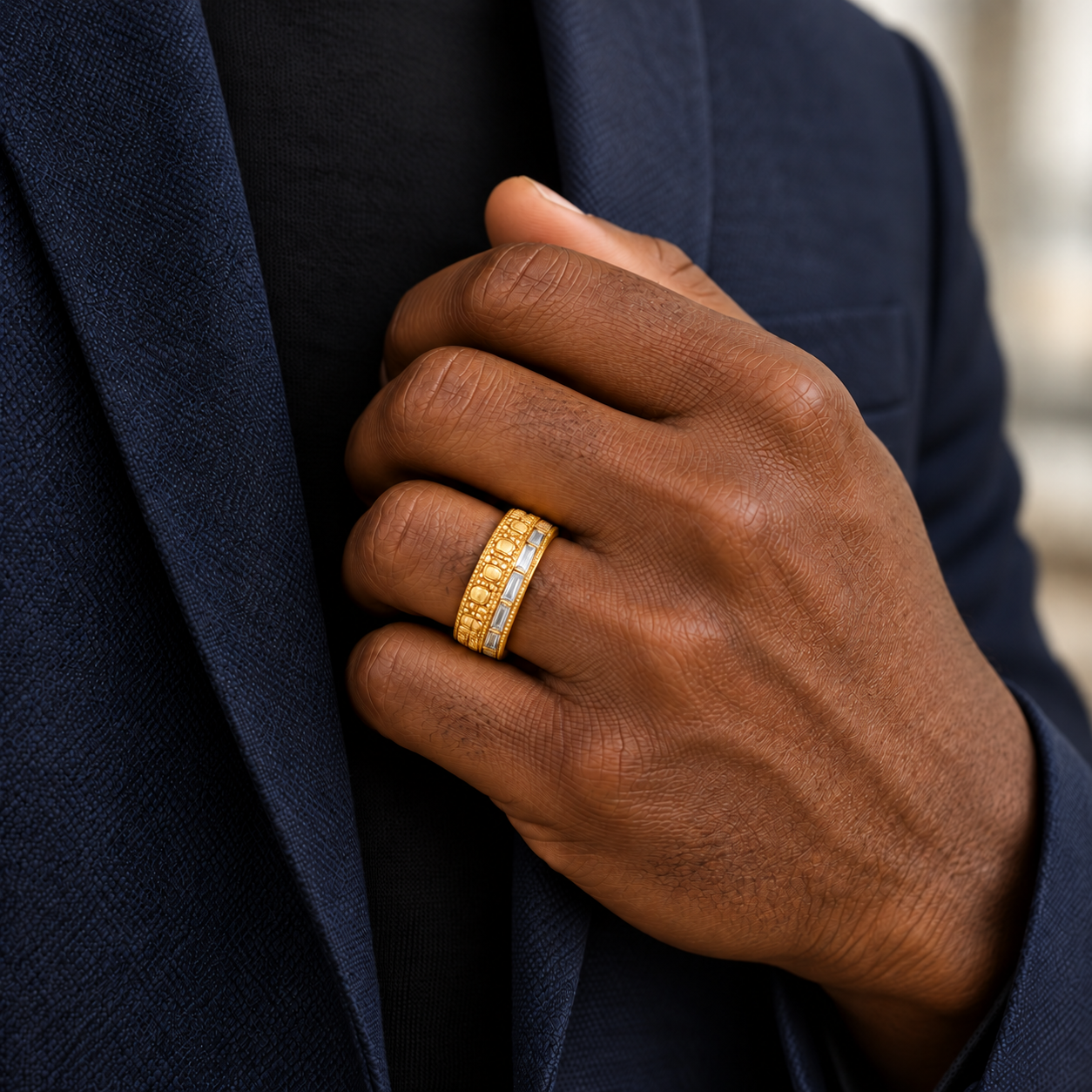 Gator Gold Band in yellow gold worn on a hand