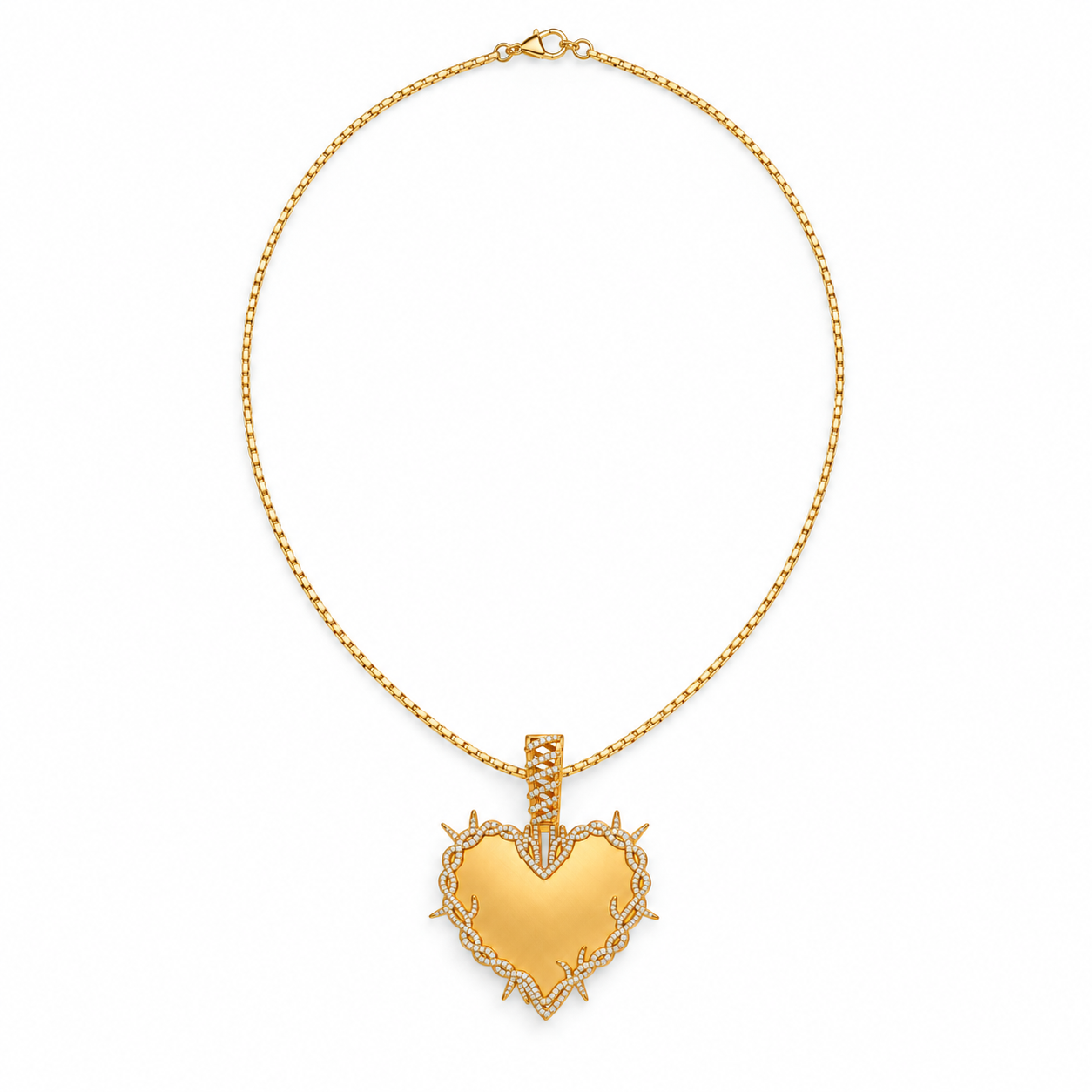 Rebel Heart Pendant in yellow gold on a complete fine chain with a lobster clasp, shown for styling only. Chain not included.
