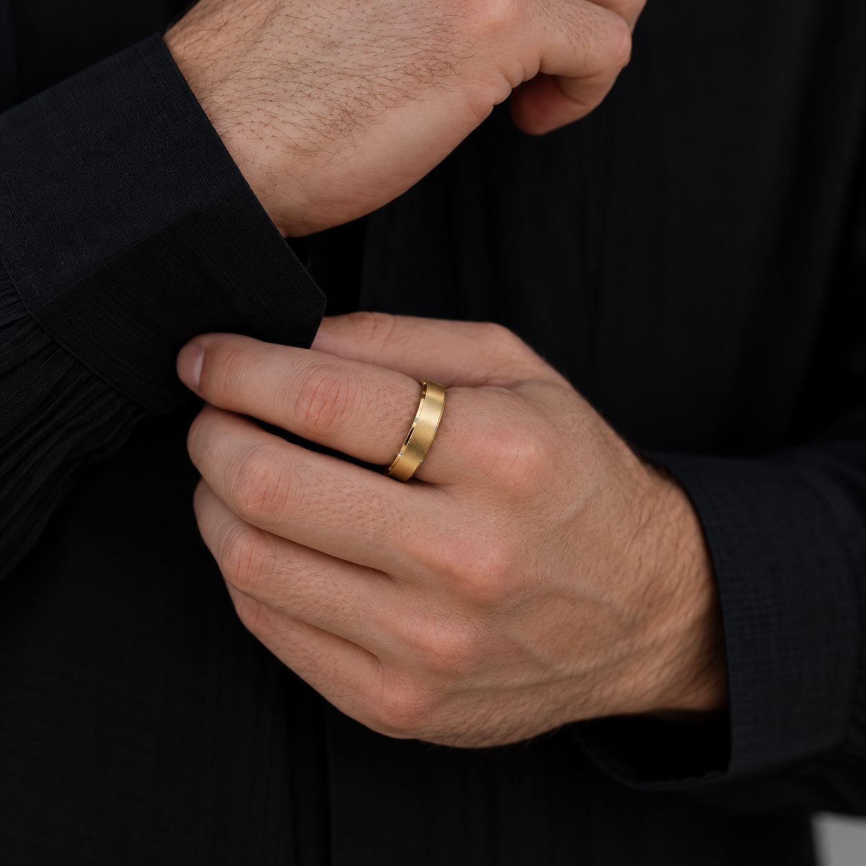 Meridian Diamond Band in yellow gold worn naturally on a hand