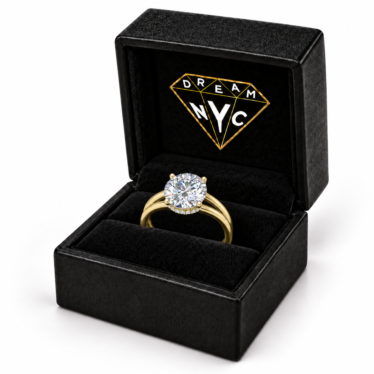 Yellow gold Vela Hidden Halo Ring seated in a black DREAM NYC ring box, packaging concept.