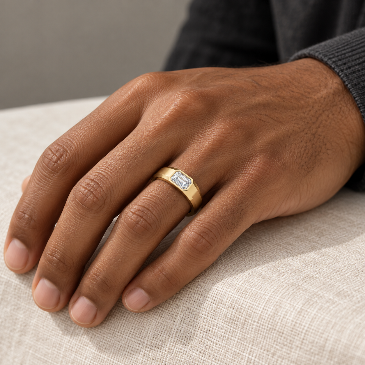 Axis Bezel Ring in yellow gold worn naturally on a hand