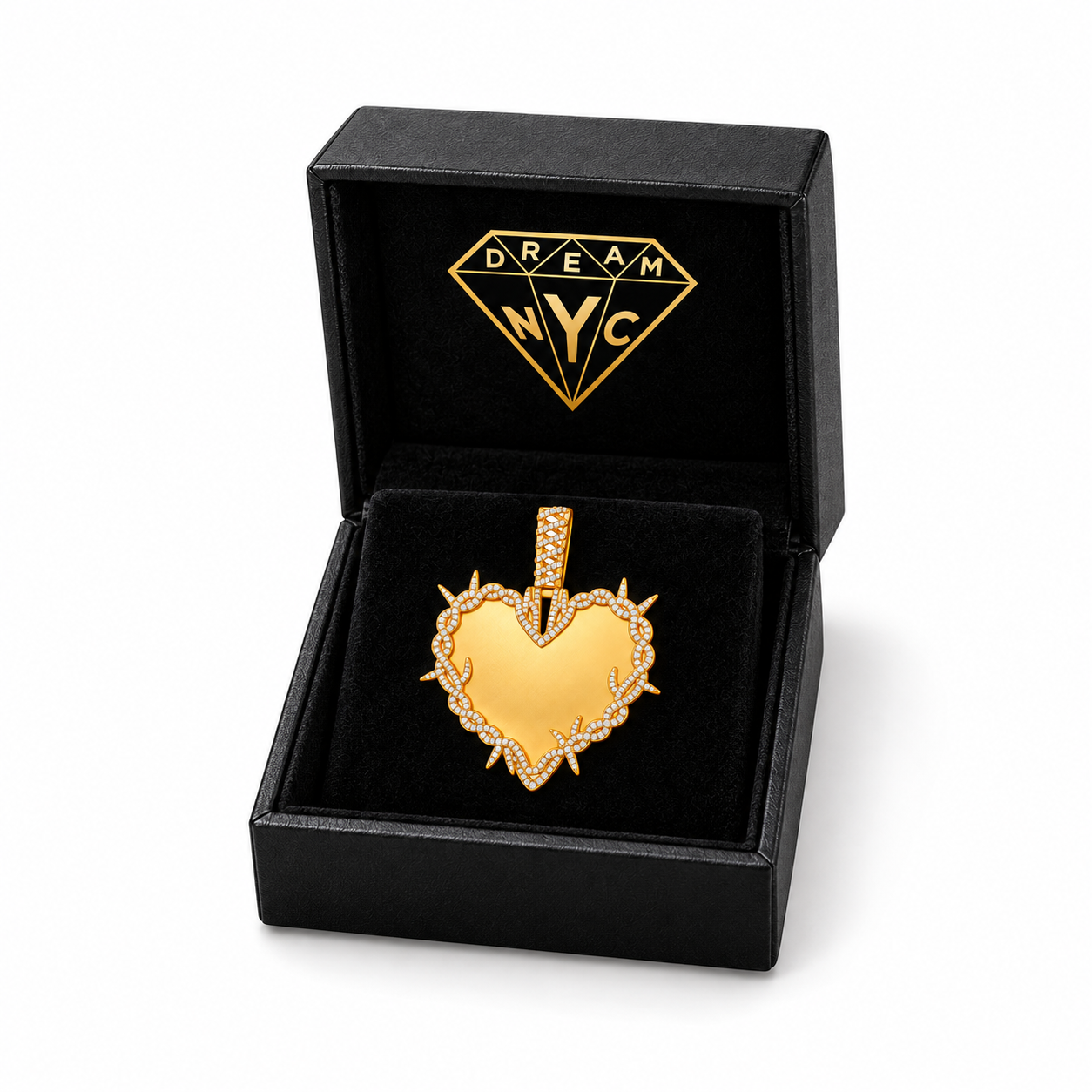 Rebel Heart Pendant in an open black DREAM NYC jewelry box, shown as a packaging concept.