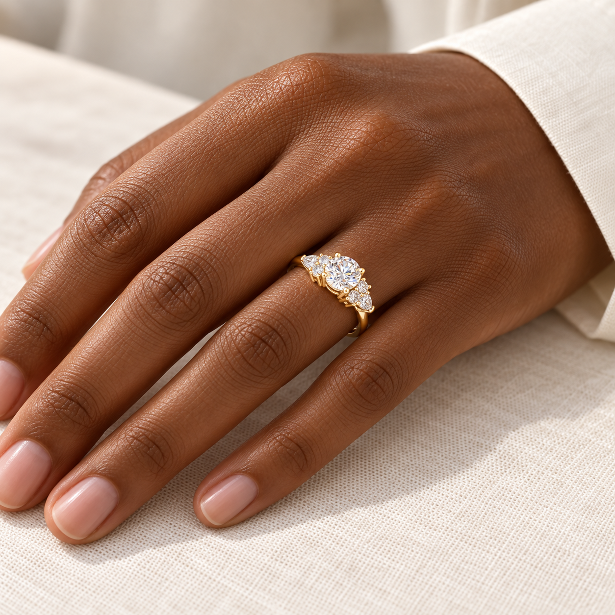 Aurelia Cluster Ring in yellow gold worn on a hand