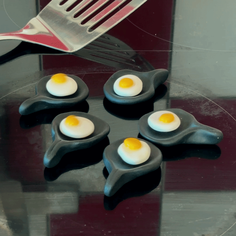 Fidget Spinner Spiegelei in Pfanne