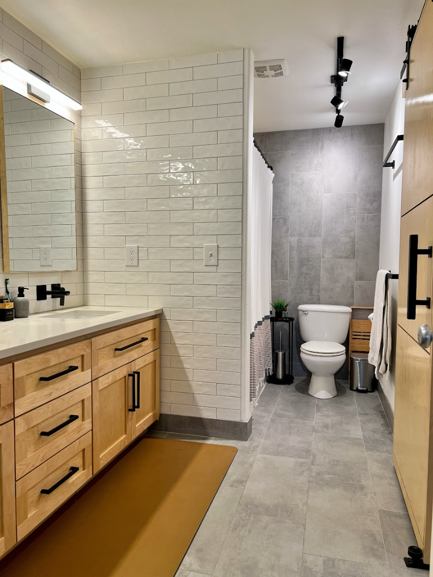 maple natural shaker vanity white subway tile.png