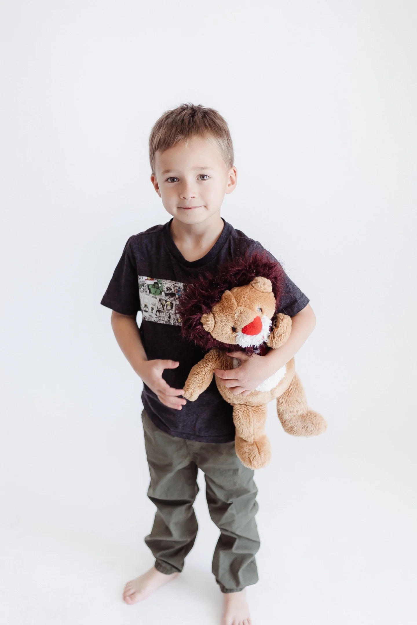 Kids Personality Sessions can be so meaningful because a photo can tell a story words never fully could.

Silas had open heart surgery and received a stuffed lion that matches his scar. We captured the sweet bond between them, along with a special po