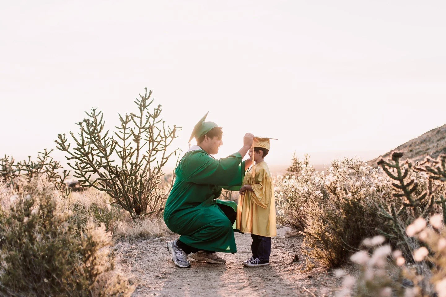 One is closing a chapter. One is just beginning theirs. ✨

A graduating senior and a graduating kindergartener, side by side. One with big dreams ahead, the other still holding onto childhood wonder.

Years from now, these photos will mean even more.