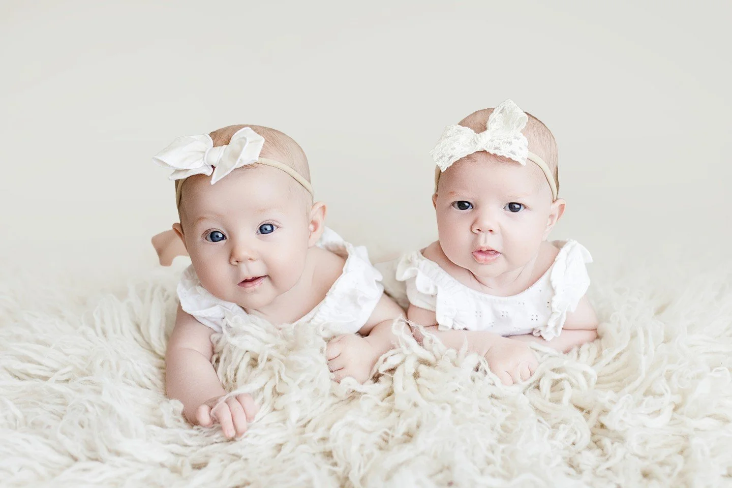 These two sweet cousins were born just seven weeks apart and live in different parts of the country, so getting them together for their first photo session was extra special.

These are the moments that are worth documenting. Before long they'll be r