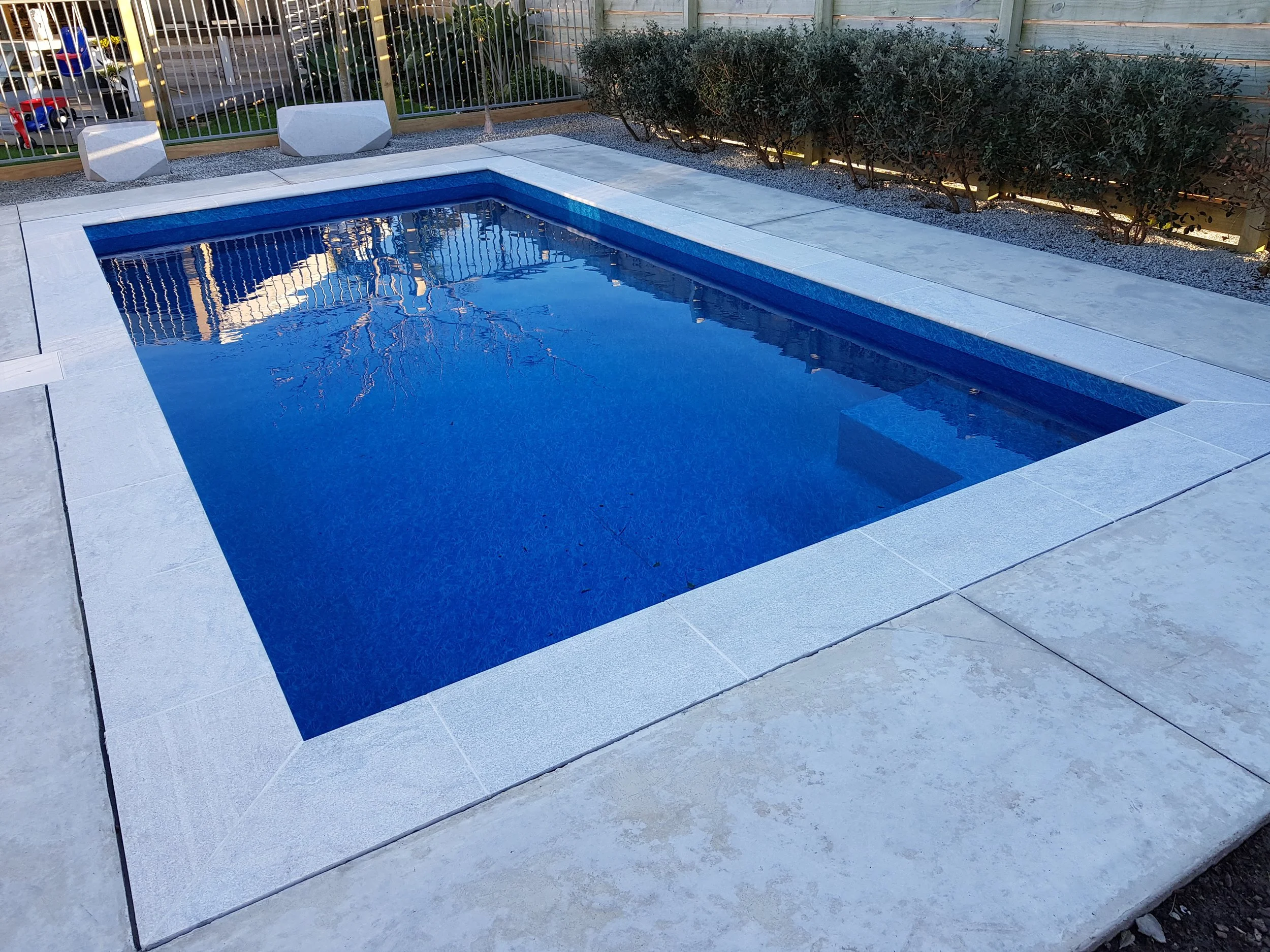 White Quartzite Bullnose with Concrete Surrounds (Copy) (Copy) (Copy)