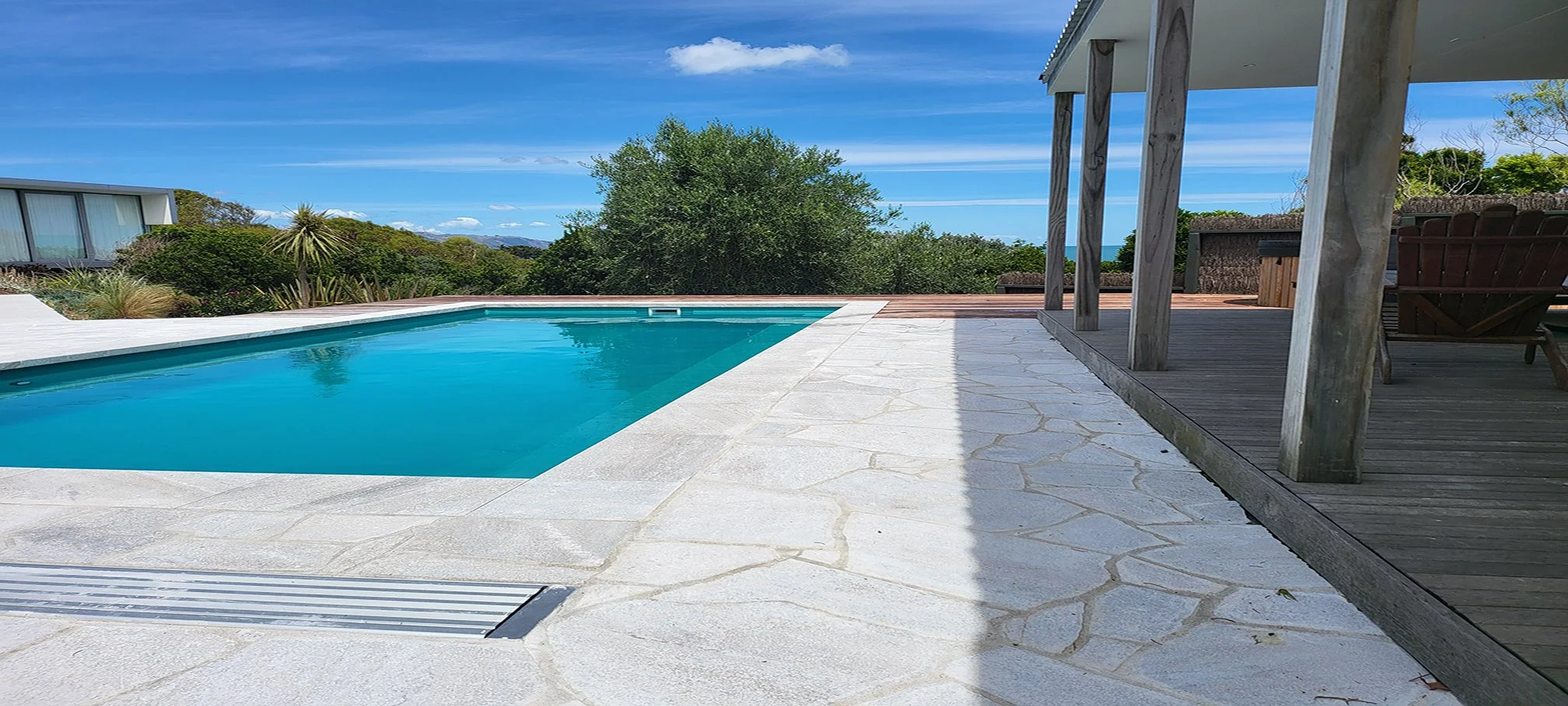 White Quartzite Crazy Paving with Dropface Pool Coping