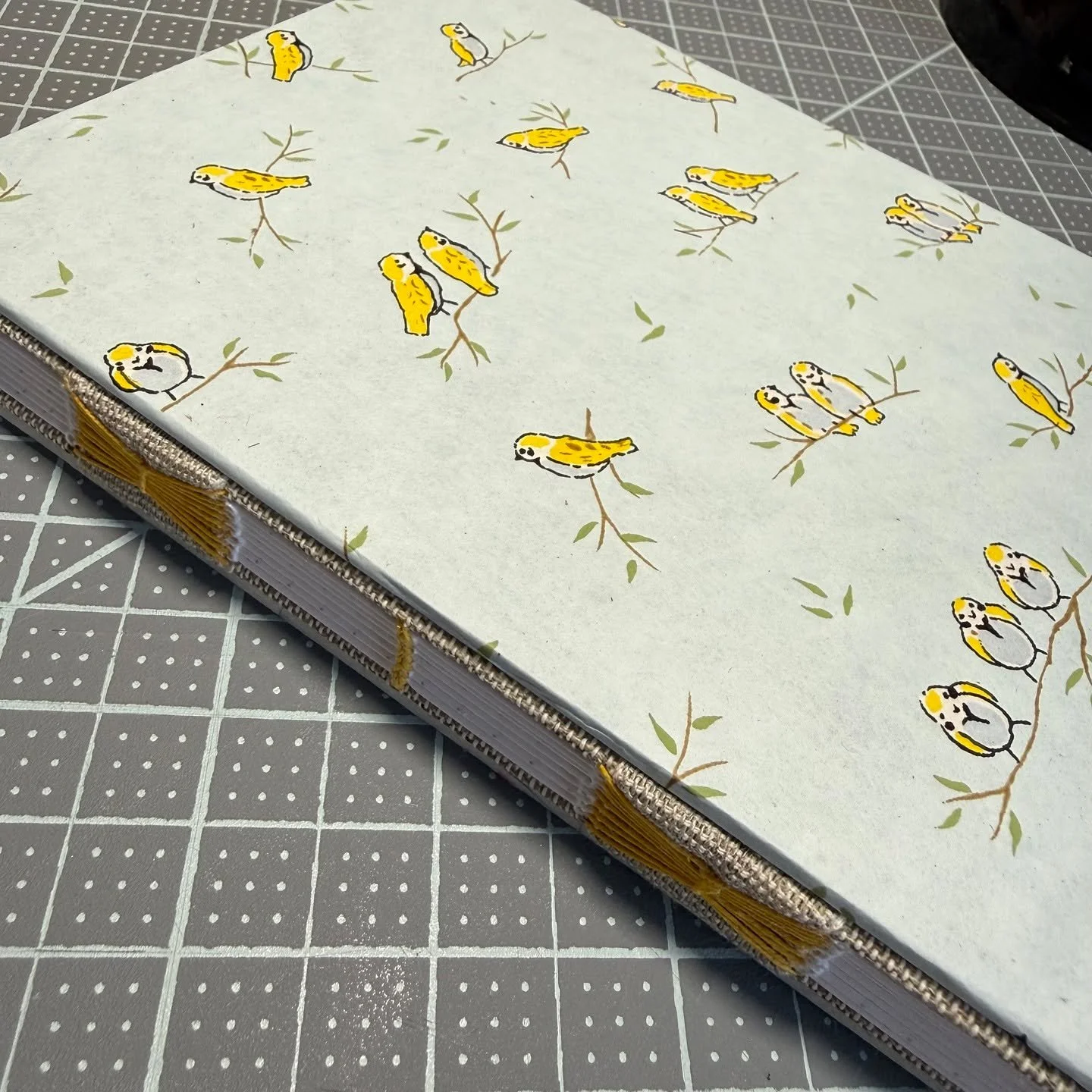 This cutie is one of my favorites from the batch of journals I listed yesterday. It has dot grid Rhodia paper, and the cover features this sweet chiyogami paper with cute birds on it. Rhodia paper is very smooth and provides a lovely writing experien