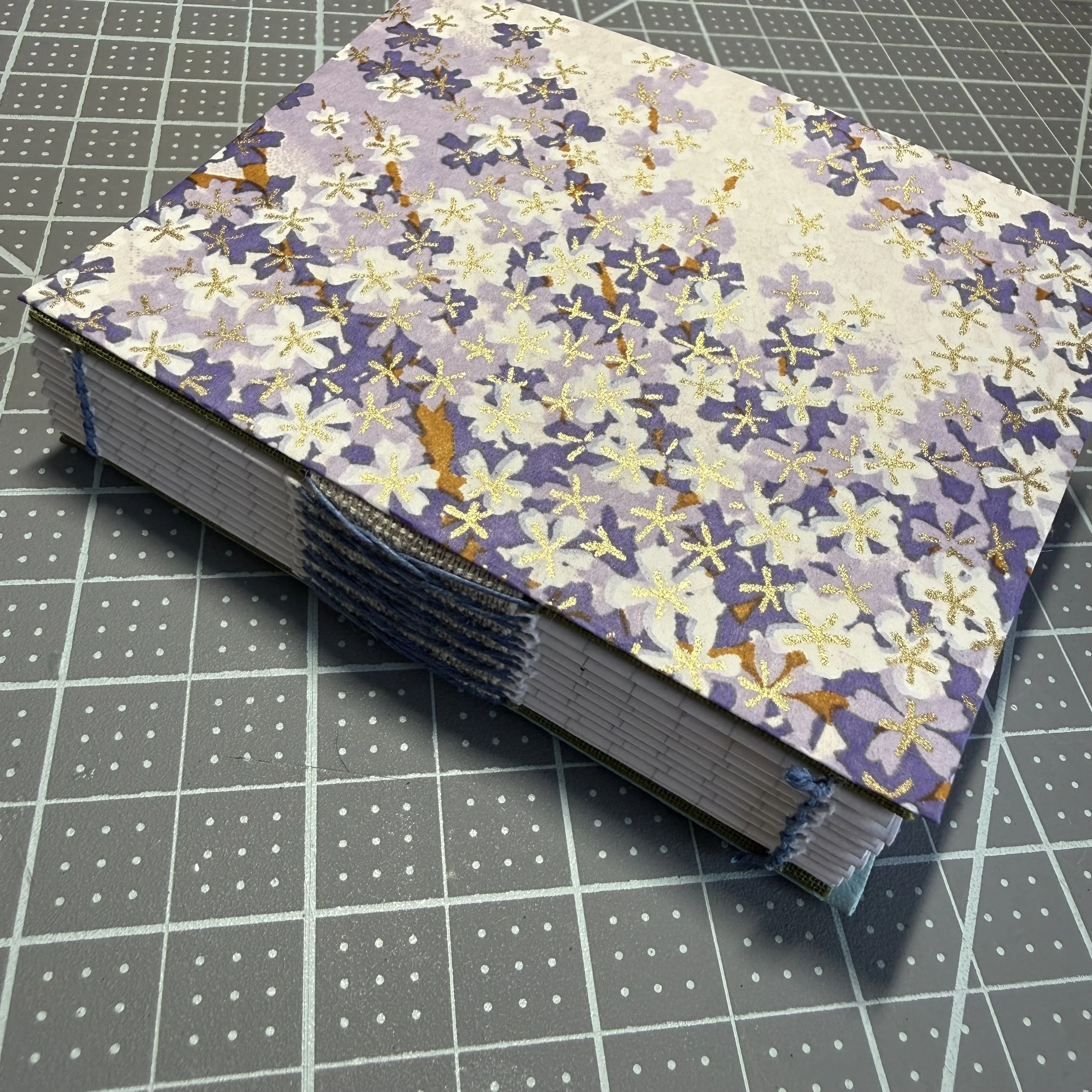 Softcover pocket notebook with grid pages