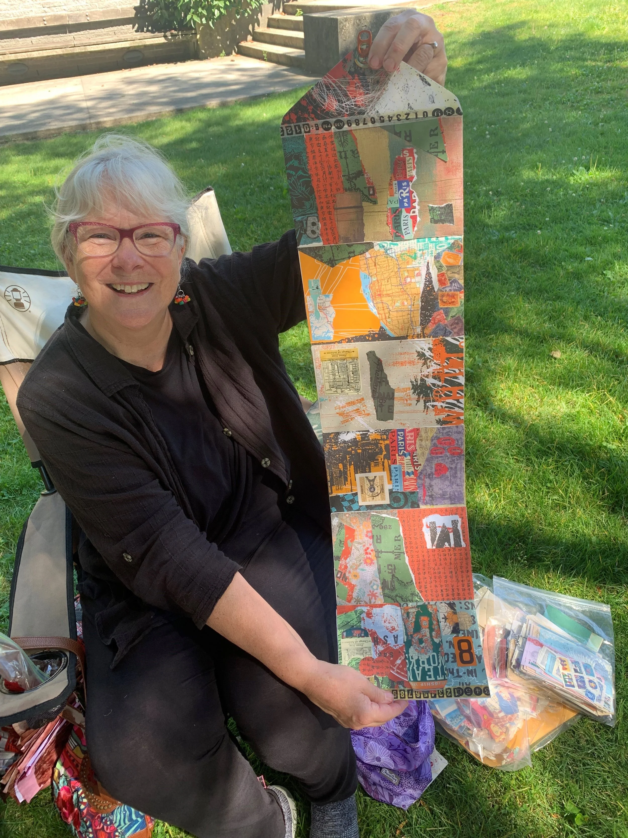 Bev with her envelope art journal made with me in a Zoom workshop.