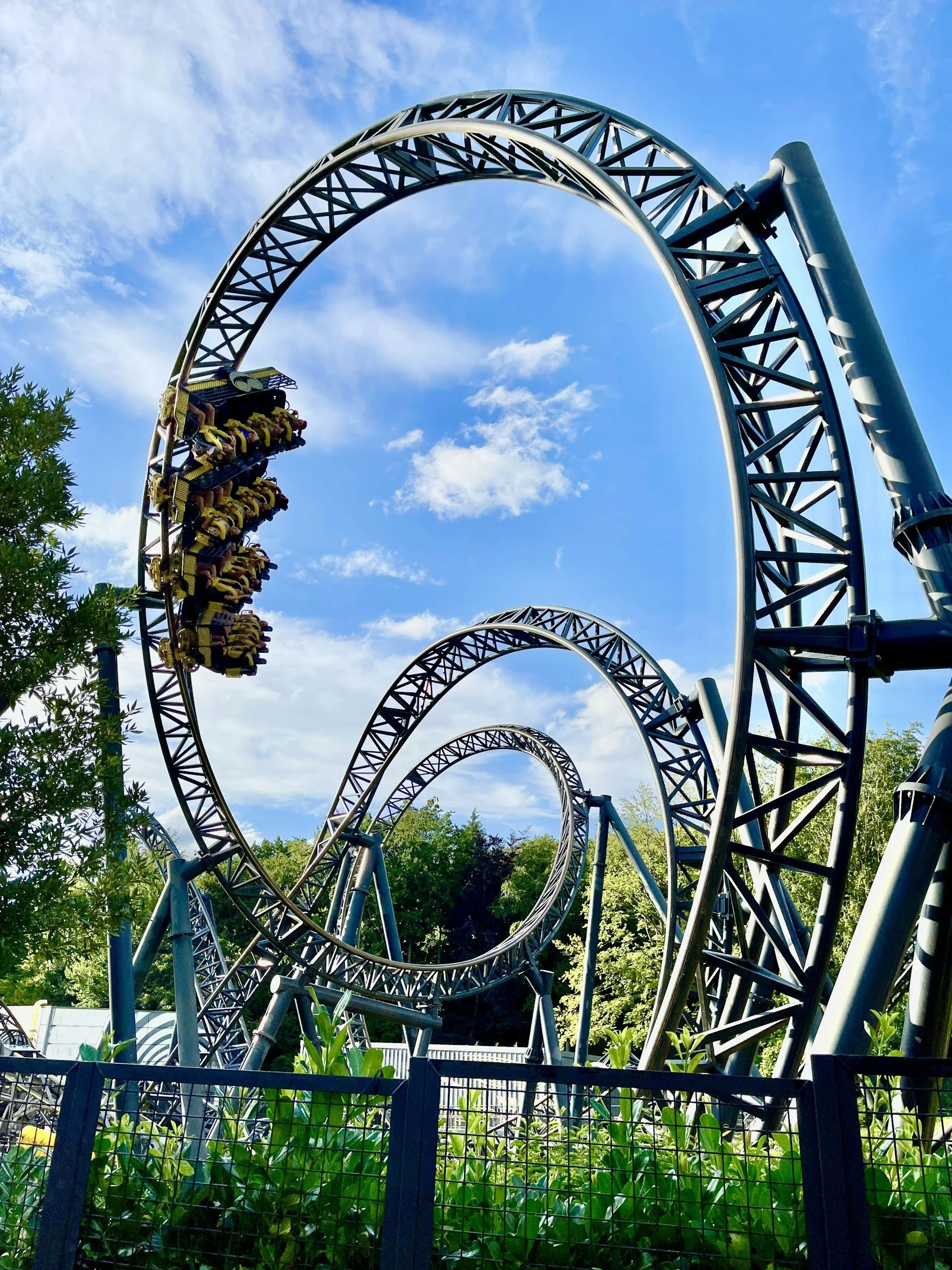 Image of a twisty roller coaster on a sunny day. Discover how somatic therapy in Pasadena, CA can help you with regulating your emotions.