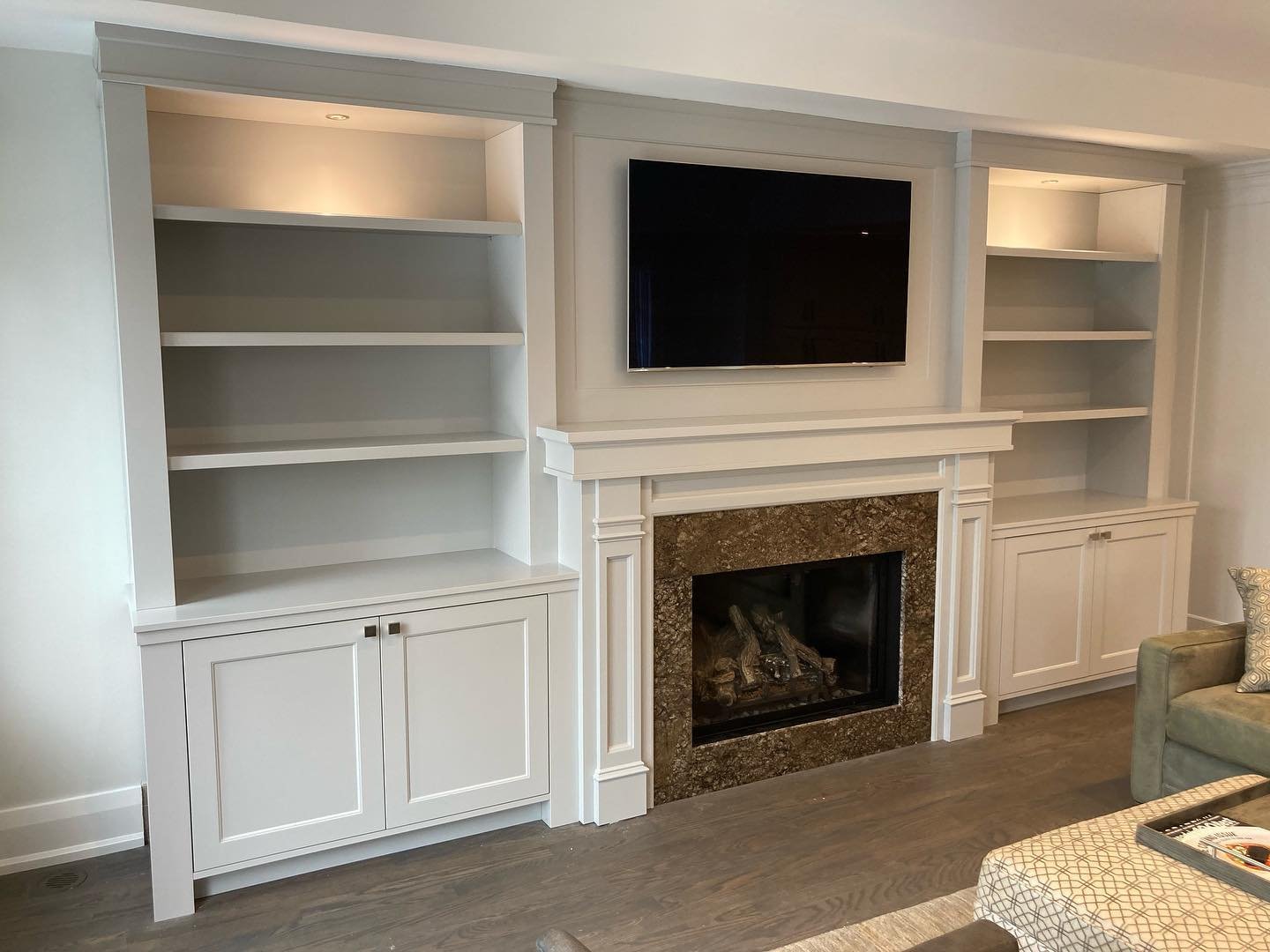 Another wall unit we completed with a fresh new mantle top and detailed back panel matching the door style #wallunit #customcabinetry #millwork #cabinetdesign #millworkdesign #design #homeimprovement #toronto #muskoka