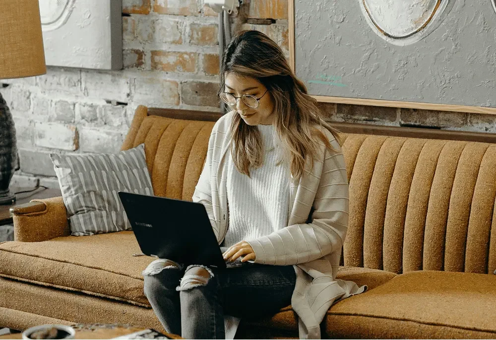 Alberta business woman working on laptop