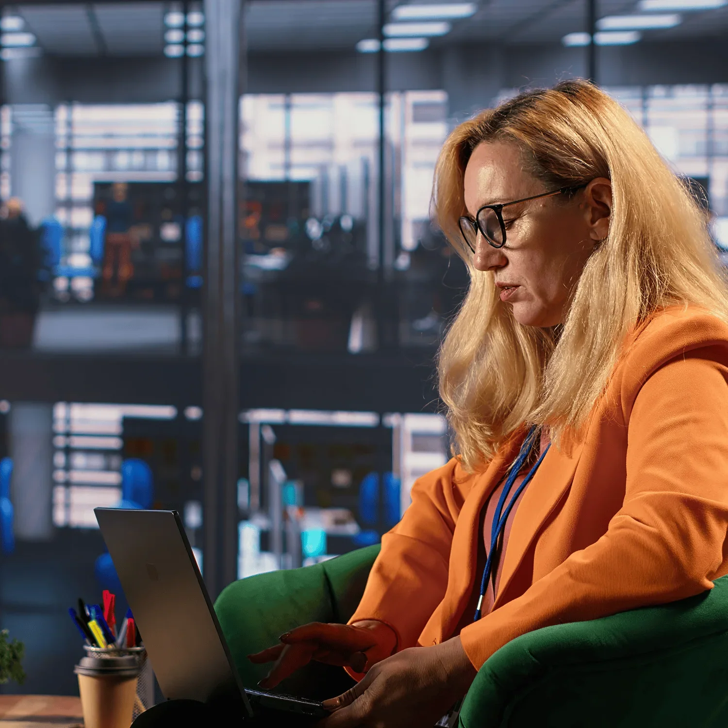 woman working on laptop building her business as an emerging founder