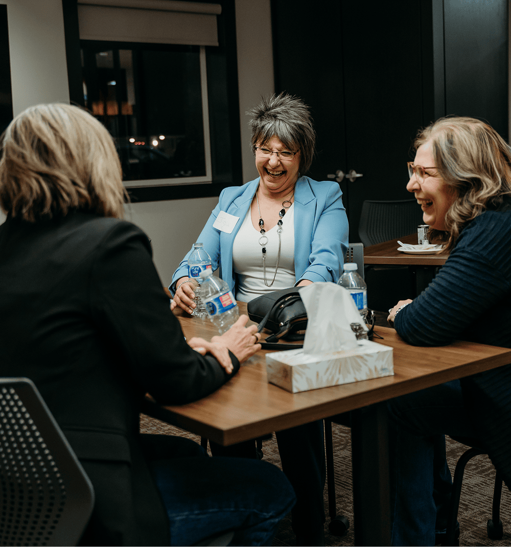 alberta women entrepeneurs sharing a joyful conversation