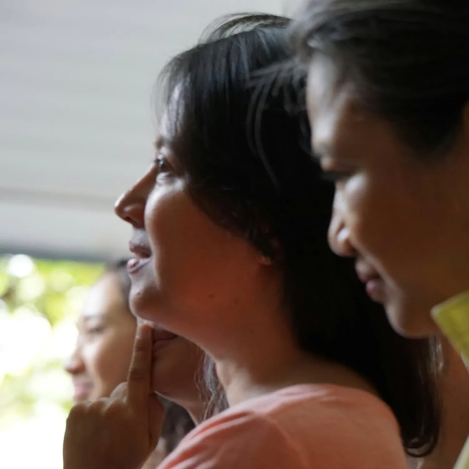 women in audience listening during business learning session